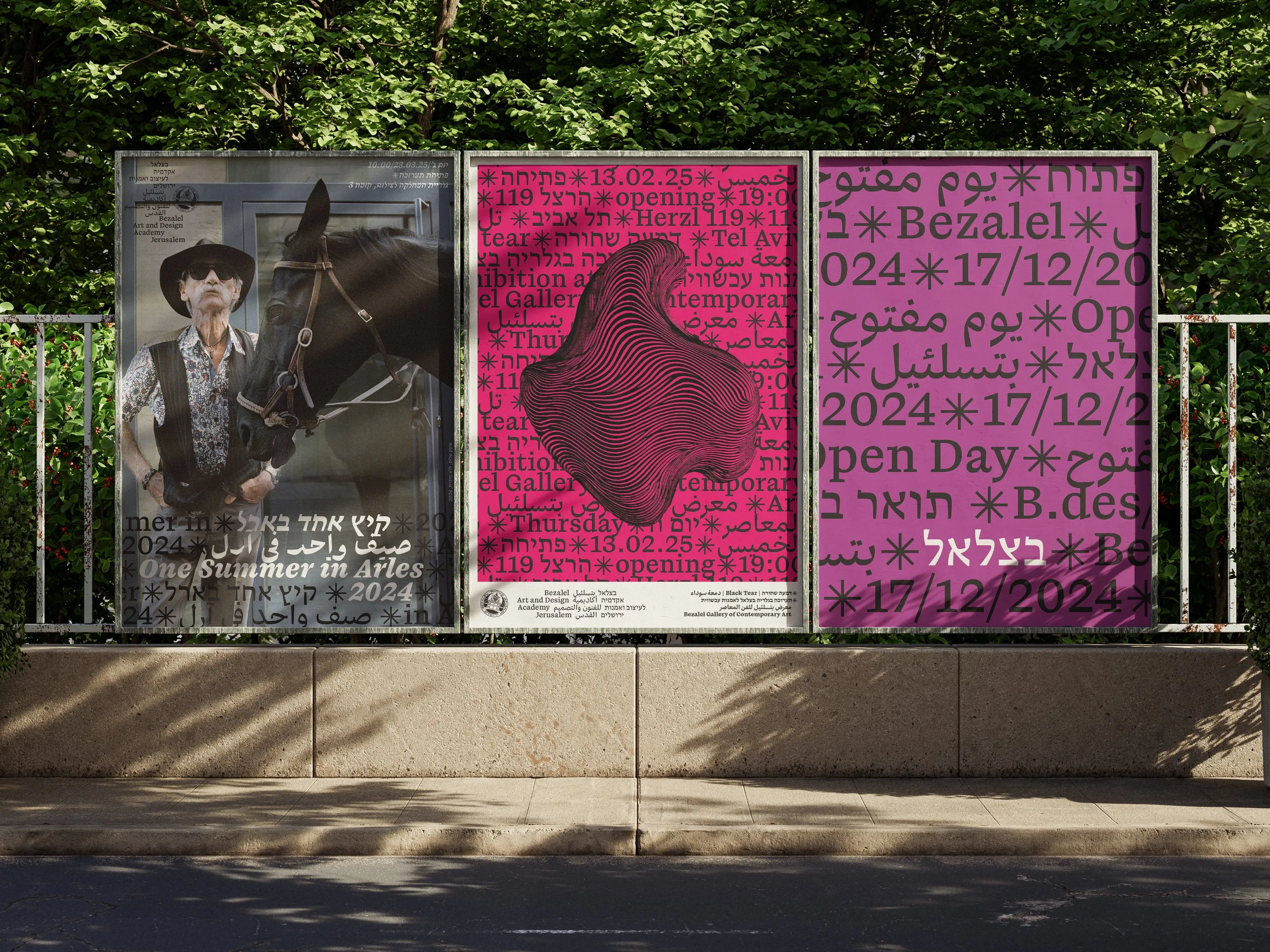 Three posters on a street fence: a portrait with a horse, a magenta render, and the Open Day pattern