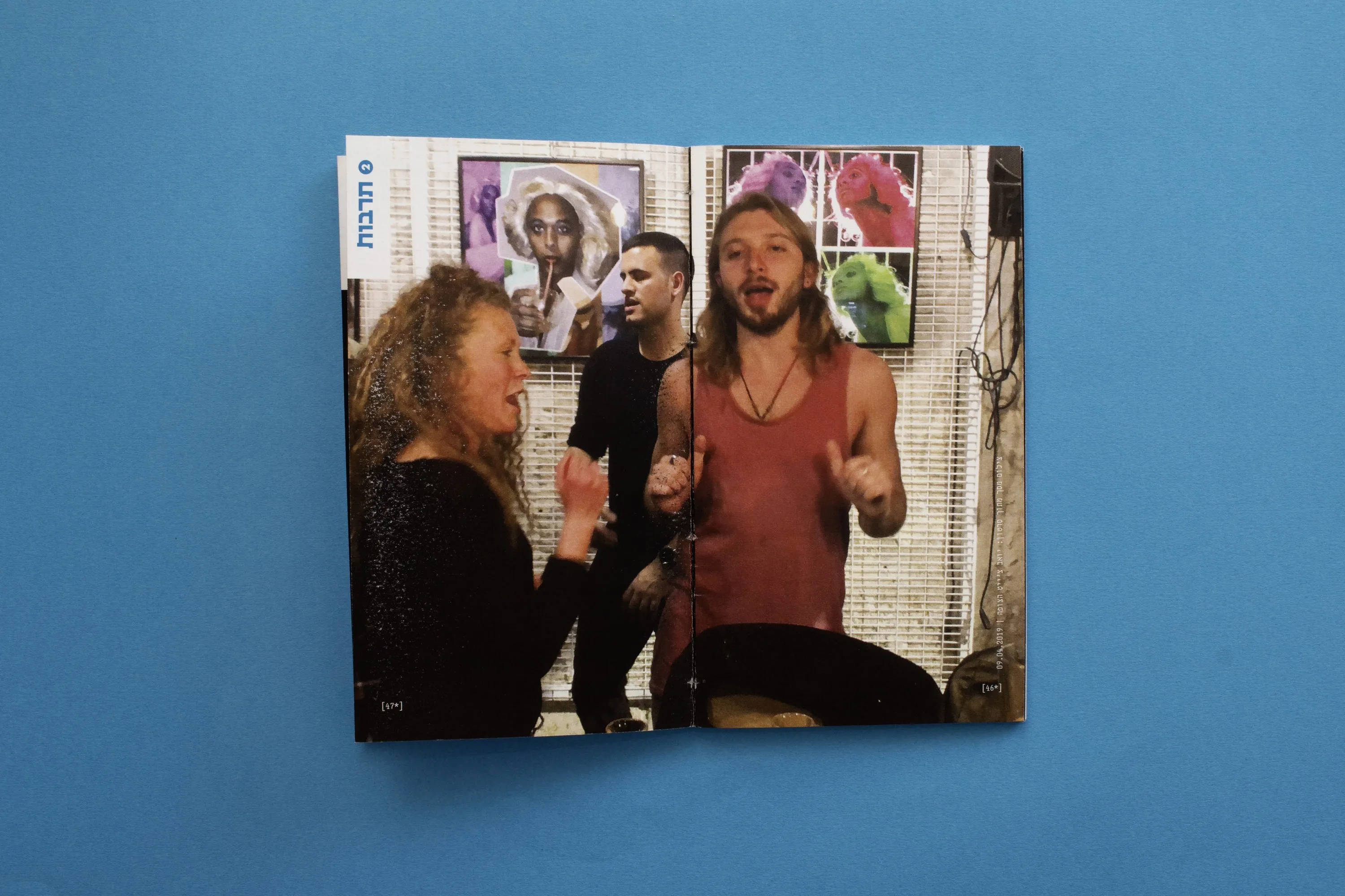 A full-bleed photograph of two people singing at the bar